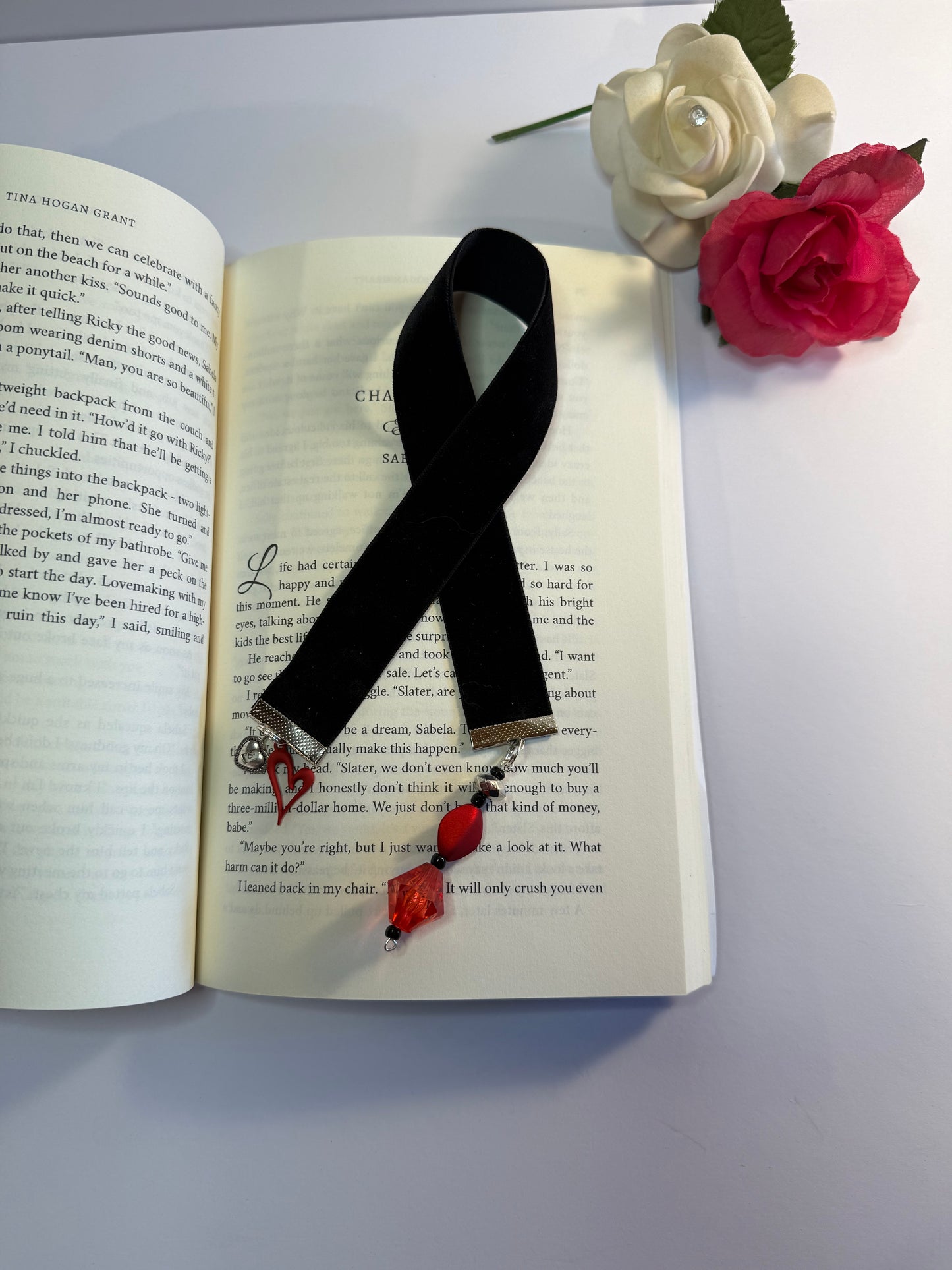 black velvet bookmark with red heart charm.