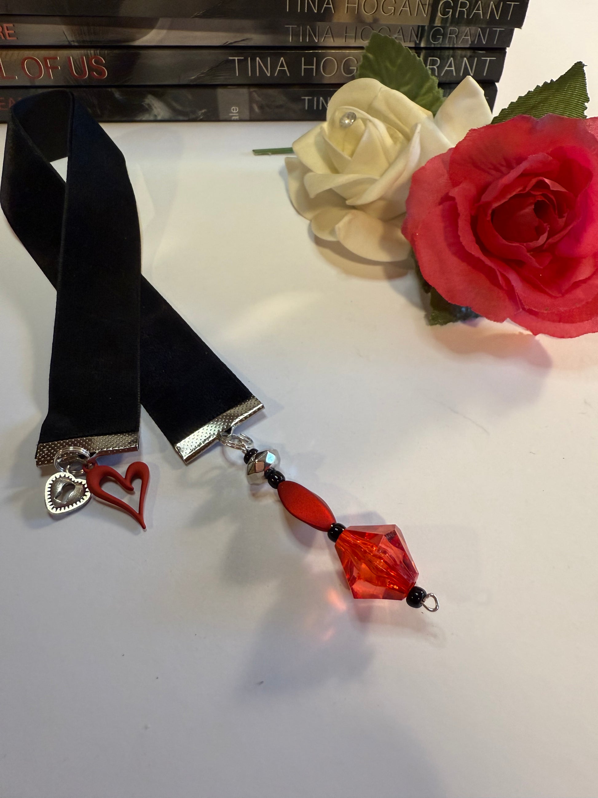 black velvet bookmark with red heart charm.