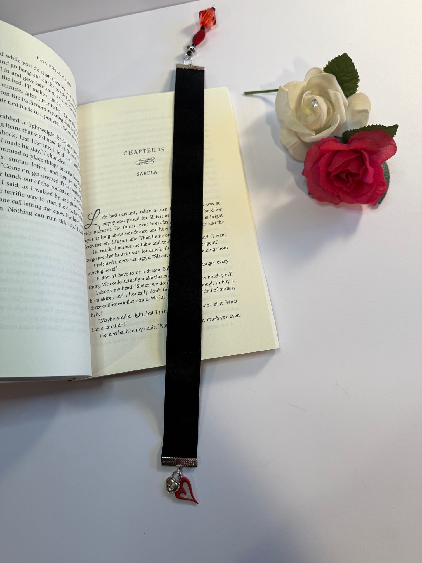 black velvet bookmark with red heart charm.